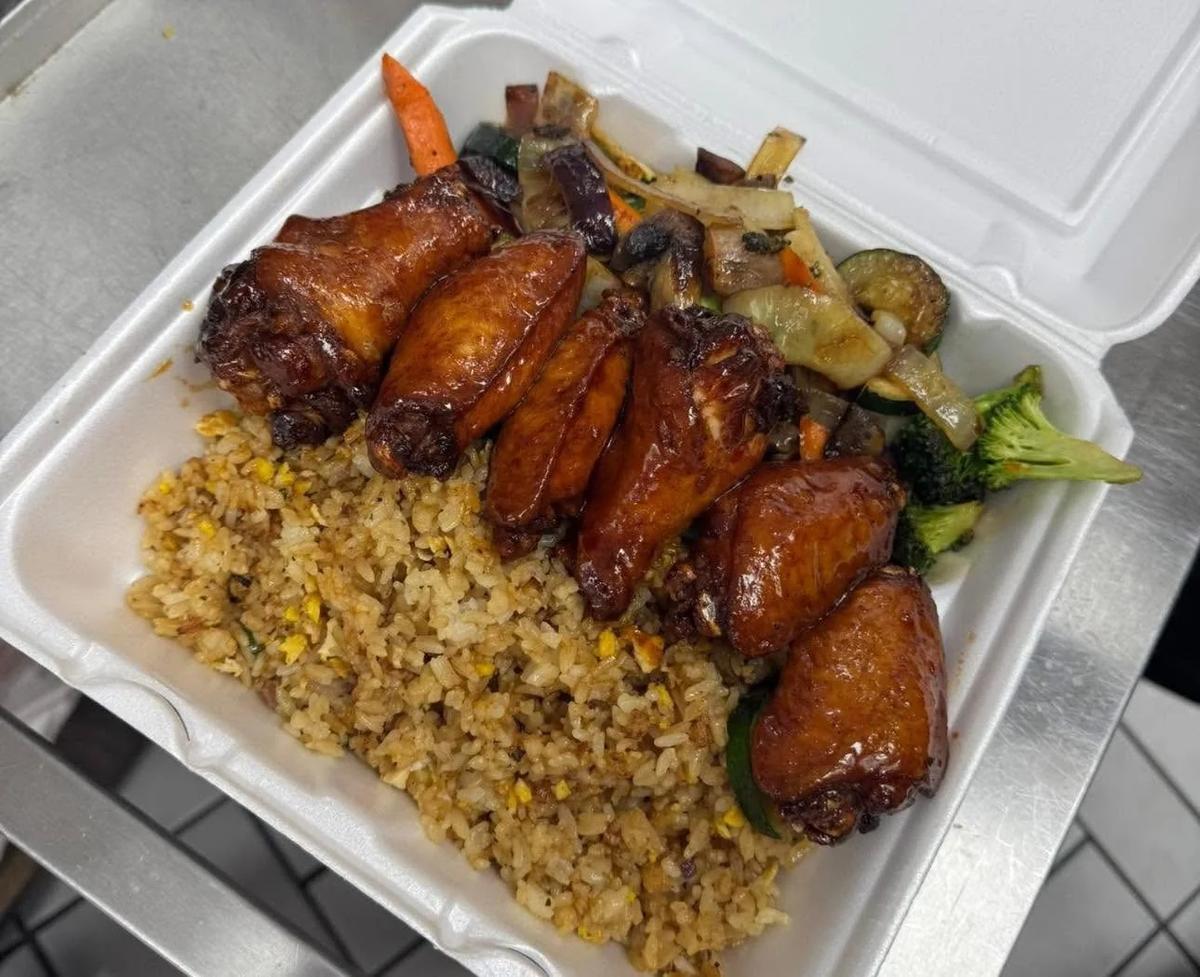 Glazed hibachi wings with fried rice and vegetables